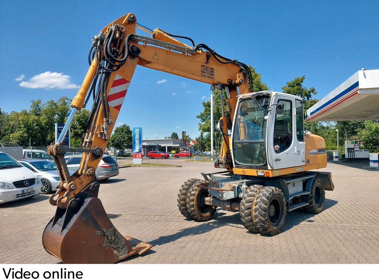 Liebherr A 316 LITRONIC TL + 2005 DEUTZ 13400 STD. Liebherr A 316 LITRONIC TL + 2005 DEUTZ 13400 STD. - Bager na kotačima: slika Liebherr A 316 LITRONIC TL + 2005 DEUTZ 13400 STD. Liebherr A 316 LITRONIC TL + 2005 DEUTZ 13400 STD. - Bager na kotačima Liebherr A 316 LITRONIC TL + 2005 DEUTZ 13400 STD. Liebherr A 316 LITRONIC TL + 2005 DEUTZ 13400 STD. - Bager na kotačima: slika Liebherr A 316 LITRONIC TL + 2005 DEUTZ 13400 STD. Liebherr A 316 LITRONIC TL + 2005 DEUTZ 13400 STD. - Bager na kotačima