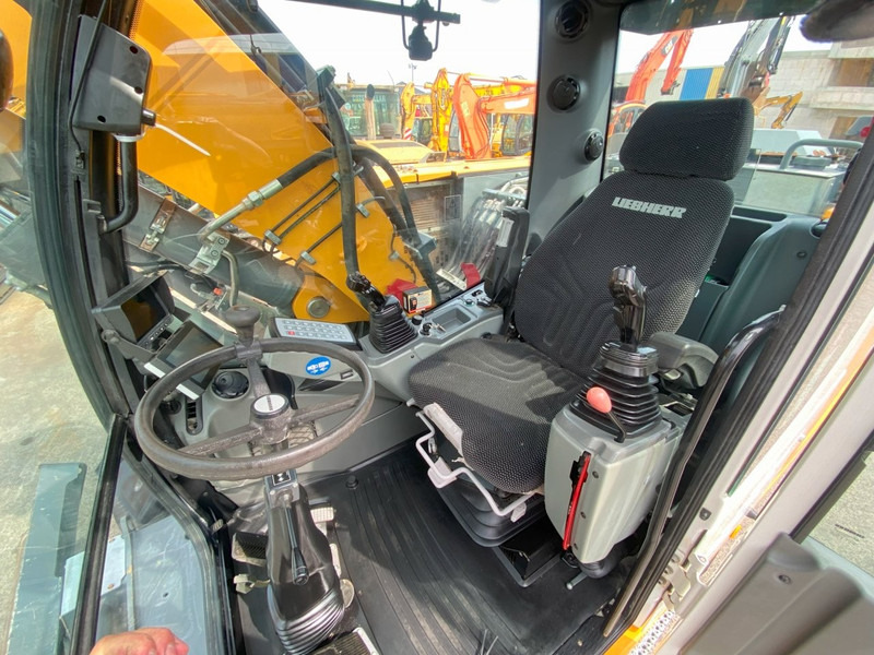 Liebherr A914 NVT - Bager na kotačima: slika Liebherr A914 NVT - Bager na kotačima Liebherr A914 NVT - Bager na kotačima: slika Liebherr A914 NVT - Bager na kotačima