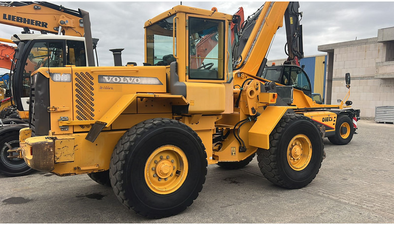 Volvo L70 D NVT - Utovarivač na kotačima: slika Volvo L70 D NVT - Utovarivač na kotačima Volvo L70 D NVT - Utovarivač na kotačima: slika Volvo L70 D NVT - Utovarivač na kotačima