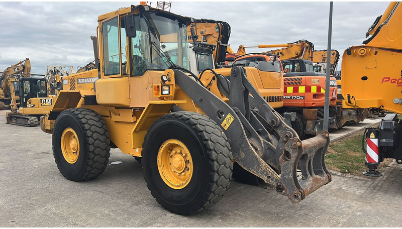 Volvo L70 D NVT - Utovarivač na kotačima: slika Volvo L70 D NVT - Utovarivač na kotačima Volvo L70 D NVT - Utovarivač na kotačima: slika Volvo L70 D NVT - Utovarivač na kotačima