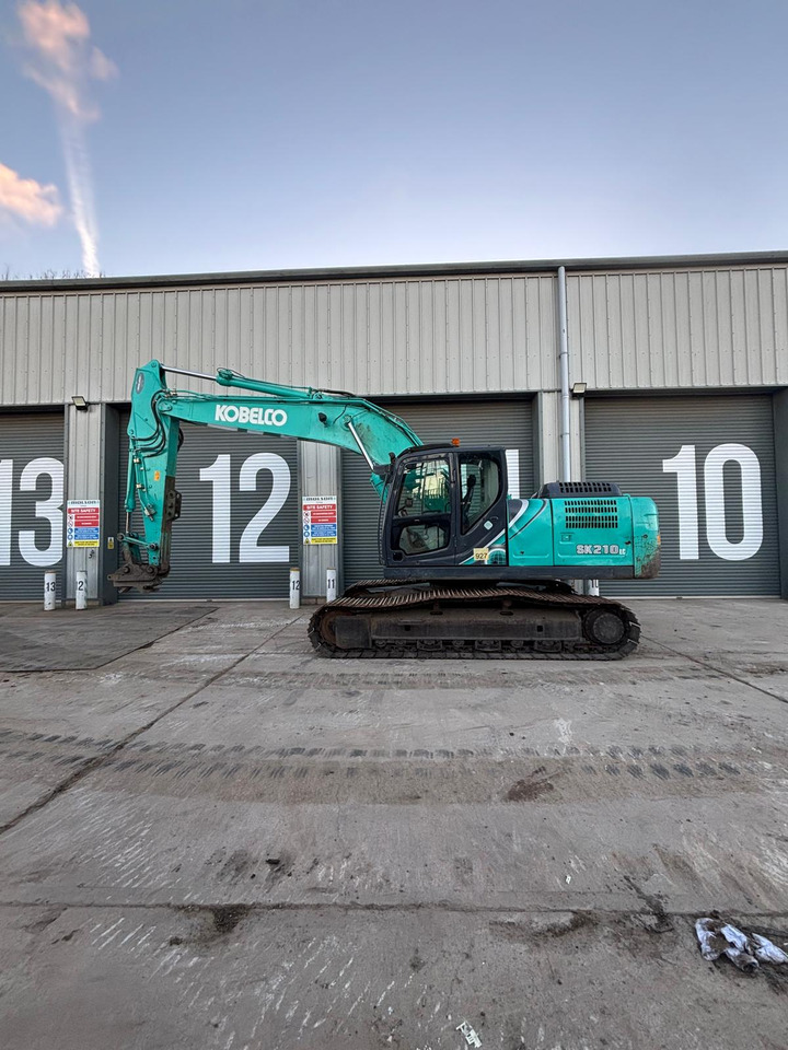 Kobelco SK210LC-10 - Bager gusjeničar: slika Kobelco SK210LC-10 - Bager gusjeničar Kobelco SK210LC-10 - Bager gusjeničar: slika Kobelco SK210LC-10 - Bager gusjeničar