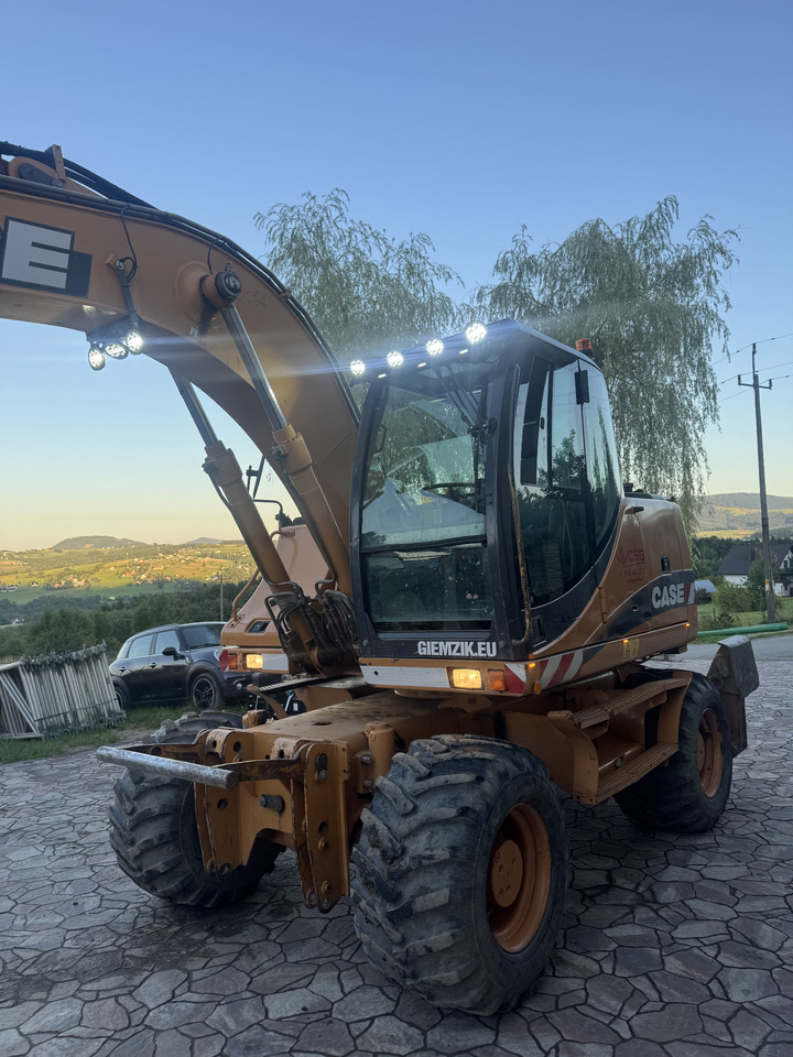 Case WX145 - Bager na kotačima: slika Case WX145 - Bager na kotačima Case WX145 - Bager na kotačima: slika Case WX145 - Bager na kotačima