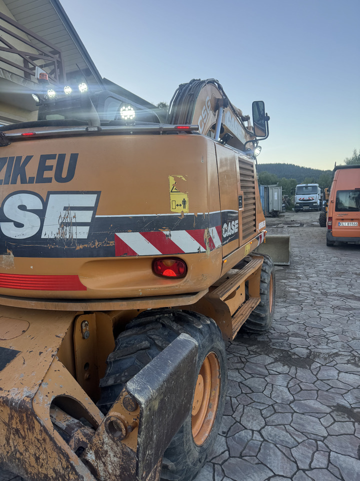 Case WX145 - Bager na kotačima: slika Case WX145 - Bager na kotačima Case WX145 - Bager na kotačima: slika Case WX145 - Bager na kotačima