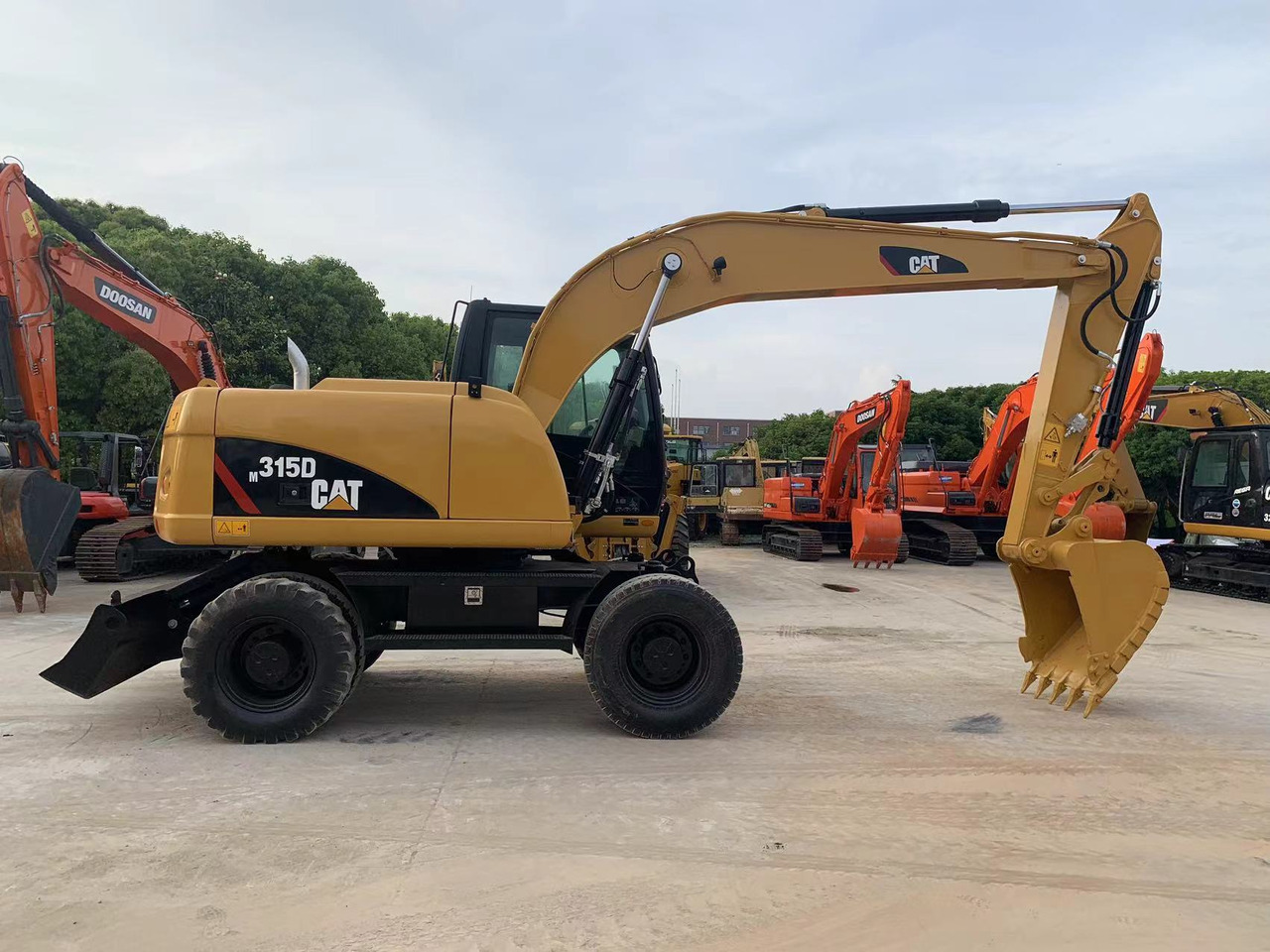 CATERPILLAR 315D - Bager na kotačima: slika CATERPILLAR 315D - Bager na kotačima CATERPILLAR 315D - Bager na kotačima: slika CATERPILLAR 315D - Bager na kotačima