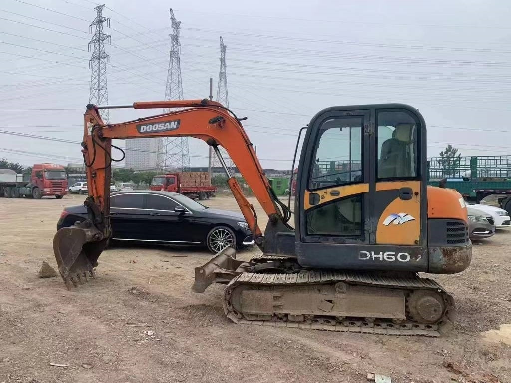 Doosan DH 60 - Mini bager: slika Doosan DH 60 - Mini bager Doosan DH 60 - Mini bager: slika Doosan DH 60 - Mini bager