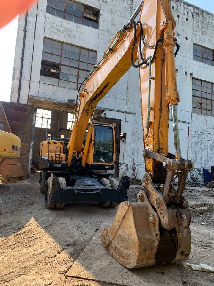 Hyundai R210W-9 - Bager na kotačima: slika Hyundai R210W-9 - Bager na kotačima Hyundai R210W-9 - Bager na kotačima: slika Hyundai R210W-9 - Bager na kotačima