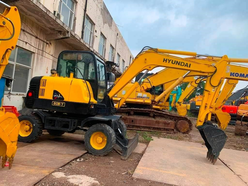 Hyundai Robex 60 W-7 - Bager na kotačima: slika Hyundai Robex 60 W-7 - Bager na kotačima Hyundai Robex 60 W-7 - Bager na kotačima: slika Hyundai Robex 60 W-7 - Bager na kotačima