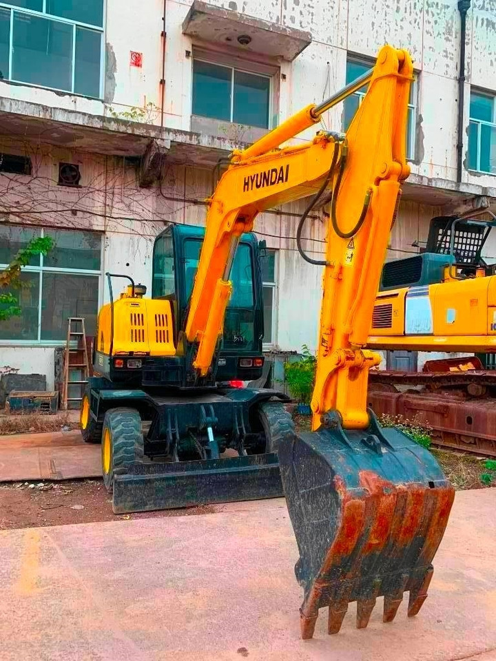 Hyundai Robex 60 W-7 - Bager na kotačima: slika Hyundai Robex 60 W-7 - Bager na kotačima Hyundai Robex 60 W-7 - Bager na kotačima: slika Hyundai Robex 60 W-7 - Bager na kotačima