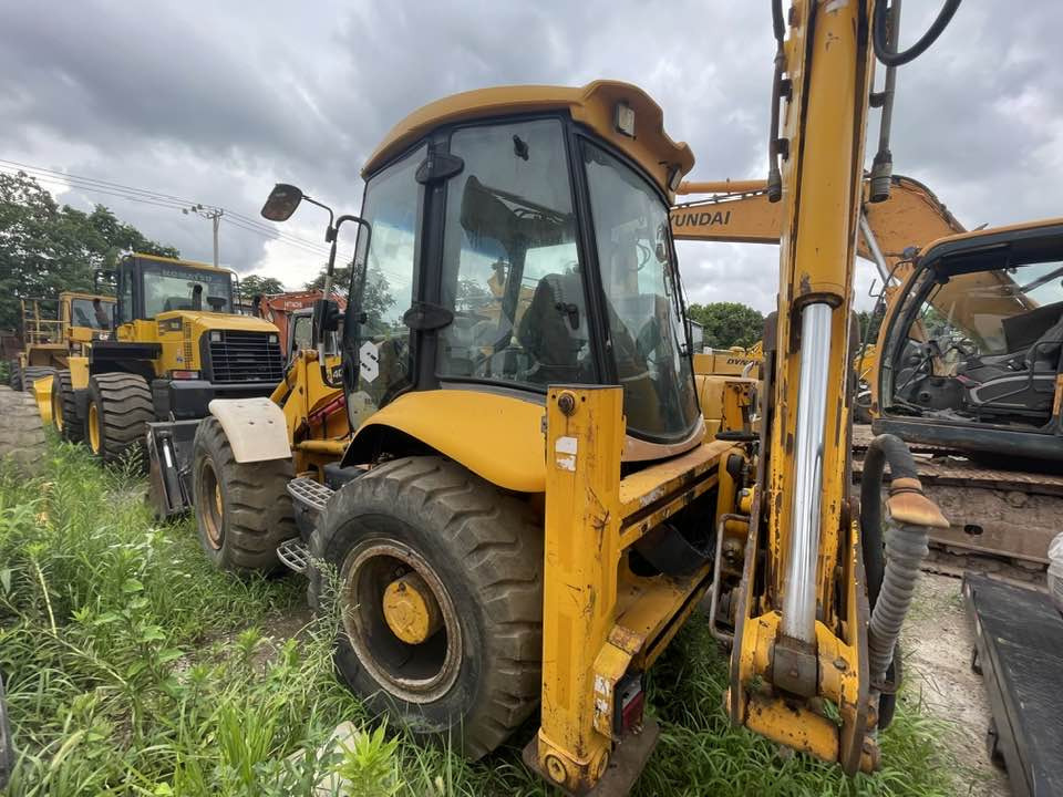 JCB 4CX Backhoe Loader - Rovokopač-utovarivač: slika JCB 4CX Backhoe Loader - Rovokopač-utovarivač JCB 4CX Backhoe Loader - Rovokopač-utovarivač: slika JCB 4CX Backhoe Loader - Rovokopač-utovarivač