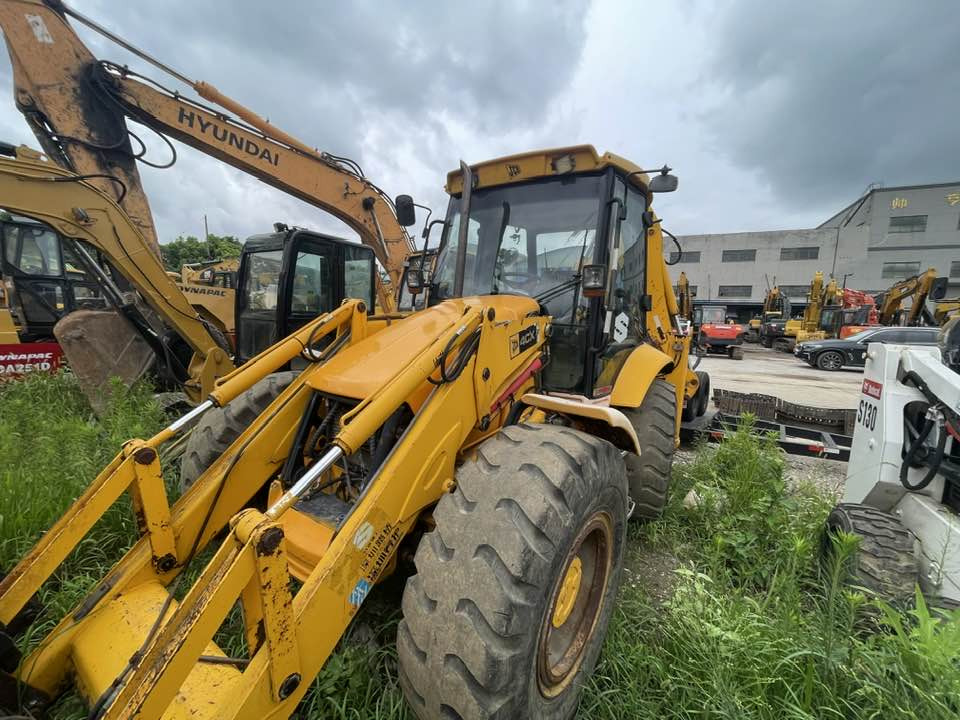 JCB 4CX Backhoe Loader - Rovokopač-utovarivač: slika JCB 4CX Backhoe Loader - Rovokopač-utovarivač JCB 4CX Backhoe Loader - Rovokopač-utovarivač: slika JCB 4CX Backhoe Loader - Rovokopač-utovarivač