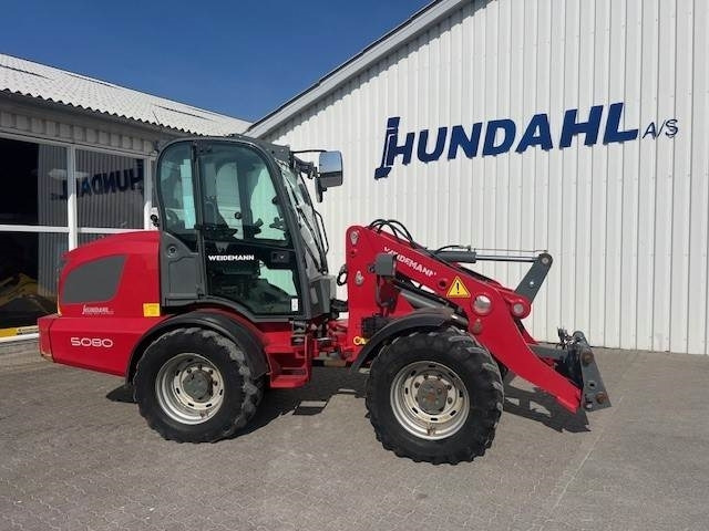 Weidemann 5080 STAGE V - Zglobni utovarivač: slika Weidemann 5080 STAGE V - Zglobni utovarivač Weidemann 5080 STAGE V - Zglobni utovarivač: slika Weidemann 5080 STAGE V - Zglobni utovarivač