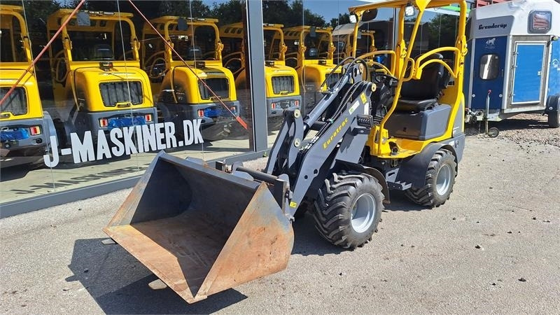 Eurotrac W11 - Zglobni utovarivač: slika Eurotrac W11 - Zglobni utovarivač Eurotrac W11 - Zglobni utovarivač: slika Eurotrac W11 - Zglobni utovarivač