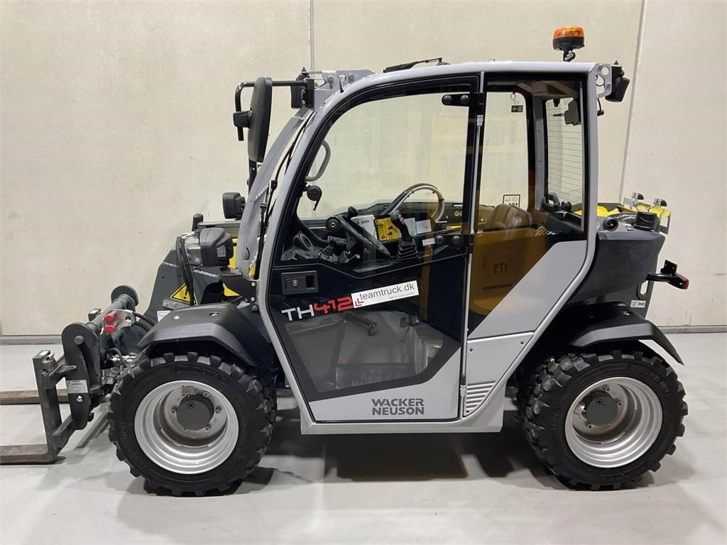Wacker Neuson TH412 - Teleskopski krak: slika Wacker Neuson TH412 - Teleskopski krak Wacker Neuson TH412 - Teleskopski krak: slika Wacker Neuson TH412 - Teleskopski krak