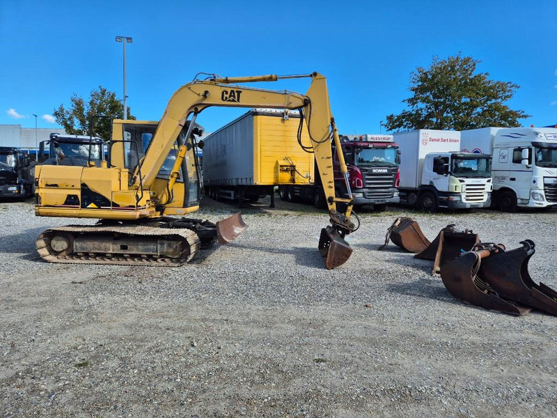 Cat 307 with extra buckets - Mini bager: slika Cat 307 with extra buckets - Mini bager Cat 307 with extra buckets - Mini bager: slika Cat 307 with extra buckets - Mini bager