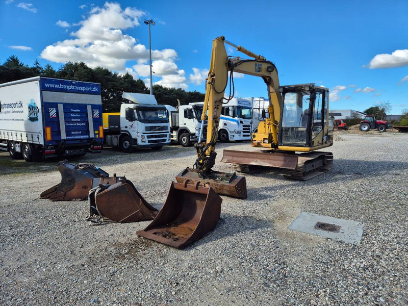 Cat 307 with extra buckets - Mini bager: slika Cat 307 with extra buckets - Mini bager Cat 307 with extra buckets - Mini bager: slika Cat 307 with extra buckets - Mini bager