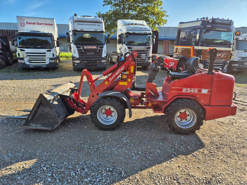 Schäffer 2345 (Bucket/Forks) - Kompaktni utovarivač gusjeničar: slika Schäffer 2345 (Bucket/Forks) - Kompaktni utovarivač gusjeničar Schäffer 2345 (Bucket/Forks) - Kompaktni utovarivač gusjeničar: slika Schäffer 2345 (Bucket/Forks) - Kompaktni utovarivač gusjeničar