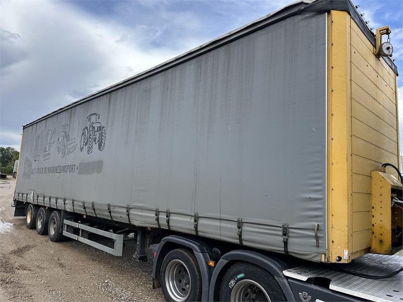 Schmitz Cargobull Machine transport trailer with bag ramp - Poluprikolica s niskim utovarivačem: slika Schmitz Cargobull Machine transport trailer with bag ramp - Poluprikolica s niskim utovarivačem Schmitz Cargobull Machine transport trailer with bag ramp - Poluprikolica s niskim utovarivačem: slika Schmitz Cargobull Machine transport trailer with bag ramp - Poluprikolica s niskim utovarivačem