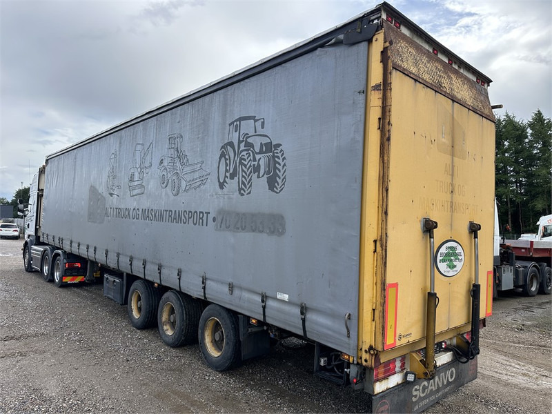 Schmitz Cargobull Machine transport trailer with bag ramp - Poluprikolica s niskim utovarivačem: slika Schmitz Cargobull Machine transport trailer with bag ramp - Poluprikolica s niskim utovarivačem Schmitz Cargobull Machine transport trailer with bag ramp - Poluprikolica s niskim utovarivačem: slika Schmitz Cargobull Machine transport trailer with bag ramp - Poluprikolica s niskim utovarivačem