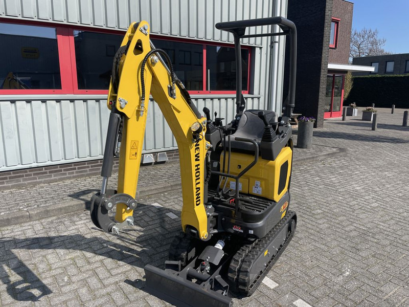 New Holland E12D Minigraver - Mini bager: slika New Holland E12D Minigraver - Mini bager New Holland E12D Minigraver - Mini bager: slika New Holland E12D Minigraver - Mini bager