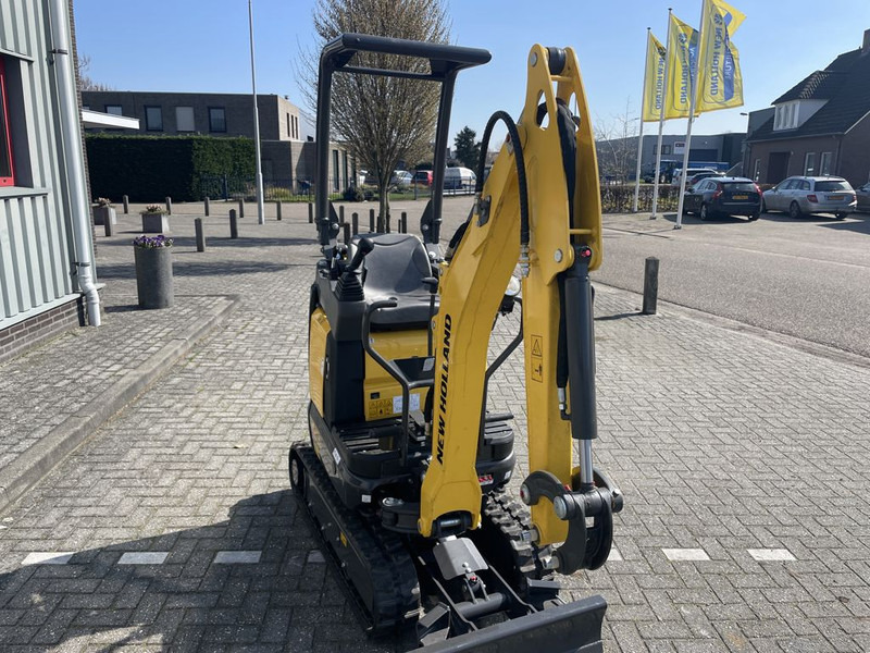 New Holland E12D Minigraver - Mini bager: slika New Holland E12D Minigraver - Mini bager New Holland E12D Minigraver - Mini bager: slika New Holland E12D Minigraver - Mini bager