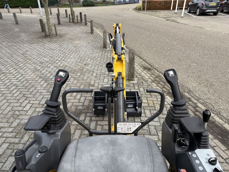 New Holland E12D Minigraver - Mini bager: slika New Holland E12D Minigraver - Mini bager New Holland E12D Minigraver - Mini bager: slika New Holland E12D Minigraver - Mini bager