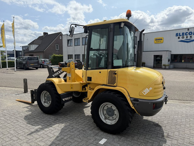 Volvo L30B Pro Shovel - Utovarivač na kotačima: slika Volvo L30B Pro Shovel - Utovarivač na kotačima Volvo L30B Pro Shovel - Utovarivač na kotačima: slika Volvo L30B Pro Shovel - Utovarivač na kotačima