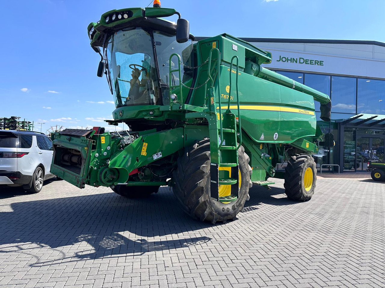 John Deere T670i HM - Kombajn za žetvu: slika John Deere T670i HM - Kombajn za žetvu John Deere T670i HM - Kombajn za žetvu: slika John Deere T670i HM - Kombajn za žetvu