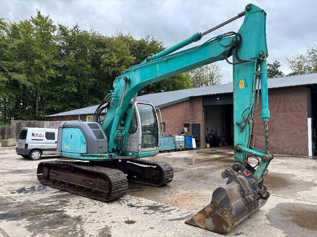 Kobelco SK 135 - Bager gusjeničar: slika Kobelco SK 135 - Bager gusjeničar Kobelco SK 135 - Bager gusjeničar: slika Kobelco SK 135 - Bager gusjeničar