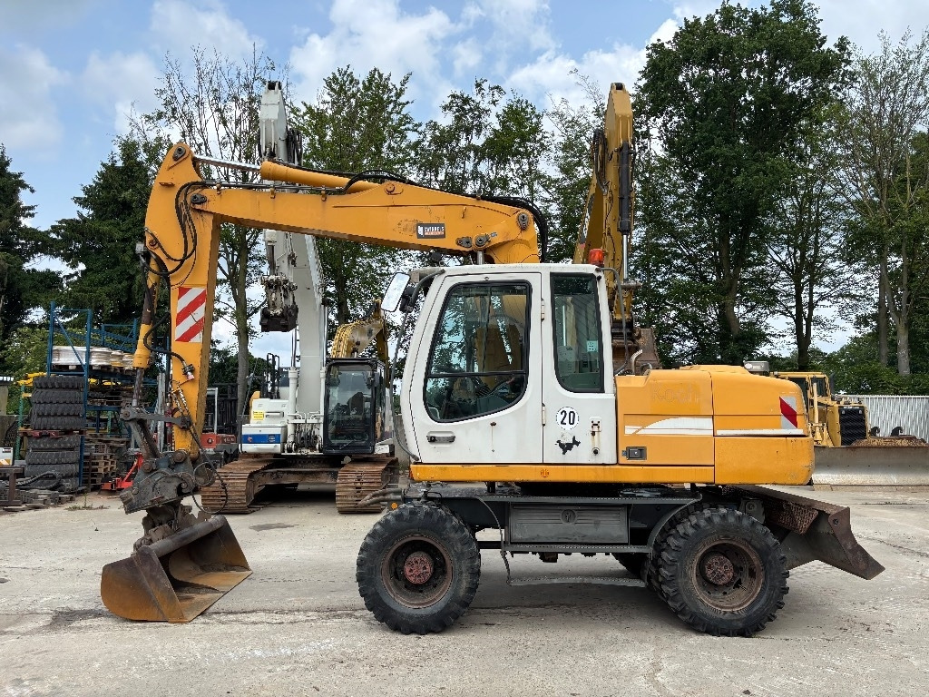 Liebherr A316 - Bager na kotačima: slika Liebherr A316 - Bager na kotačima Liebherr A316 - Bager na kotačima: slika Liebherr A316 - Bager na kotačima