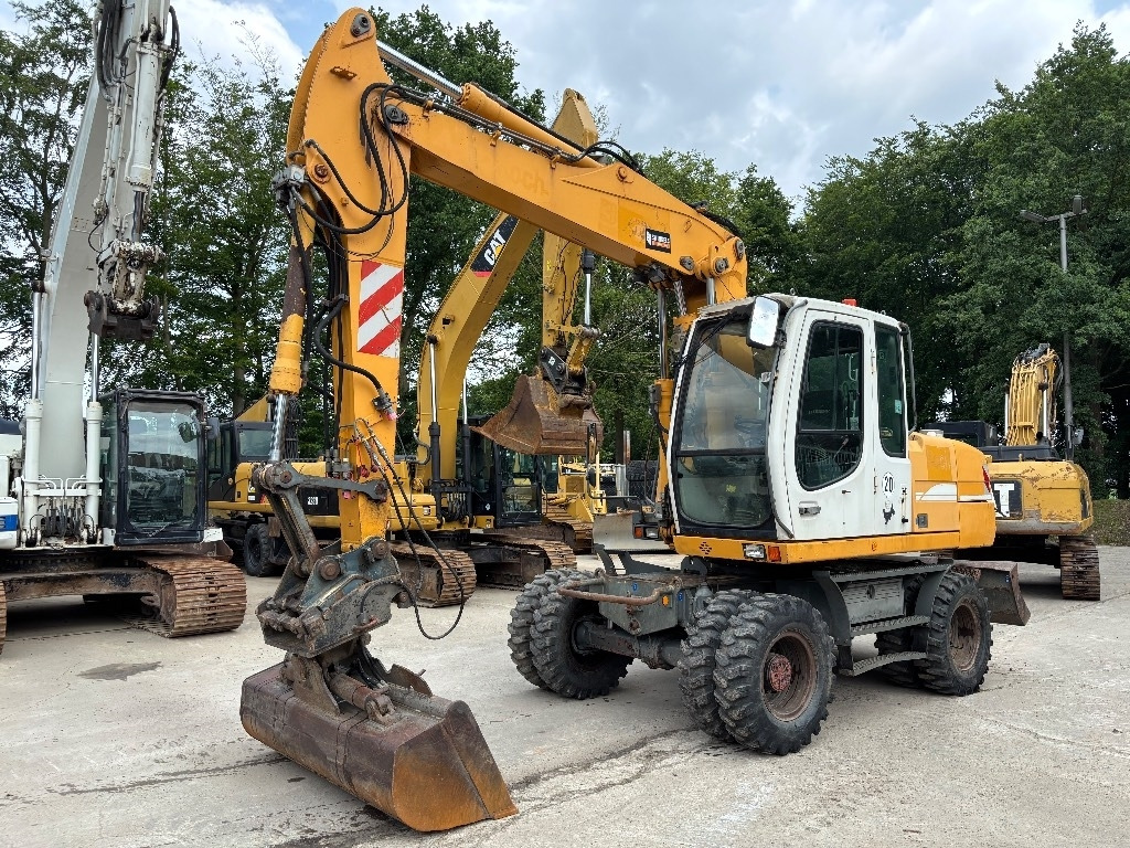Liebherr A316 - Bager na kotačima: slika Liebherr A316 - Bager na kotačima Liebherr A316 - Bager na kotačima: slika Liebherr A316 - Bager na kotačima