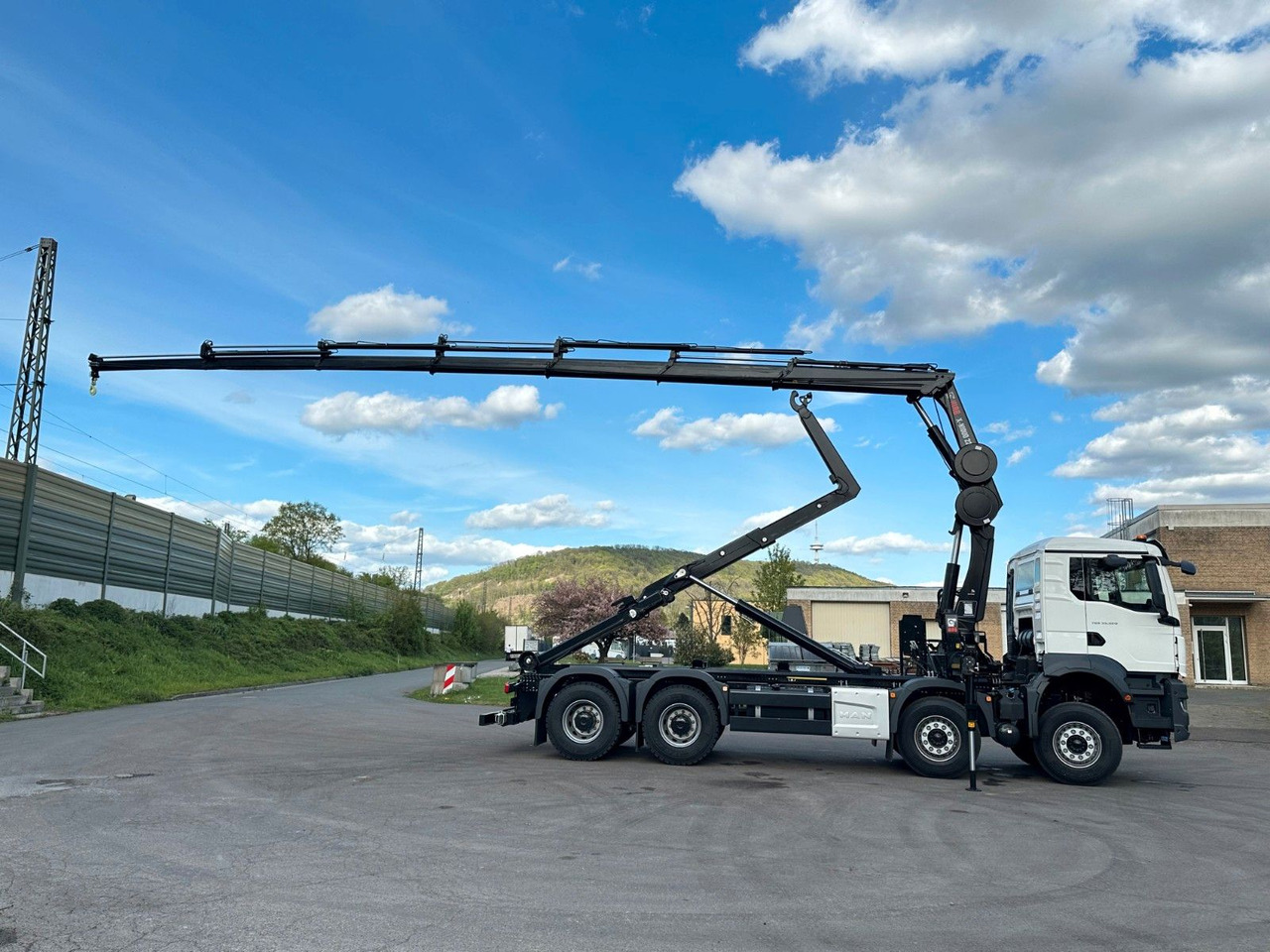 Kamion s kukastom dizalicom, Kamion s kranom MAN TGS 35.520 8x4  Abrollkipper + Kran HIAB 228-6: slika Kamion s kukastom dizalicom, Kamion s kranom MAN TGS 35.520 8x4  Abrollkipper + Kran HIAB 228-6