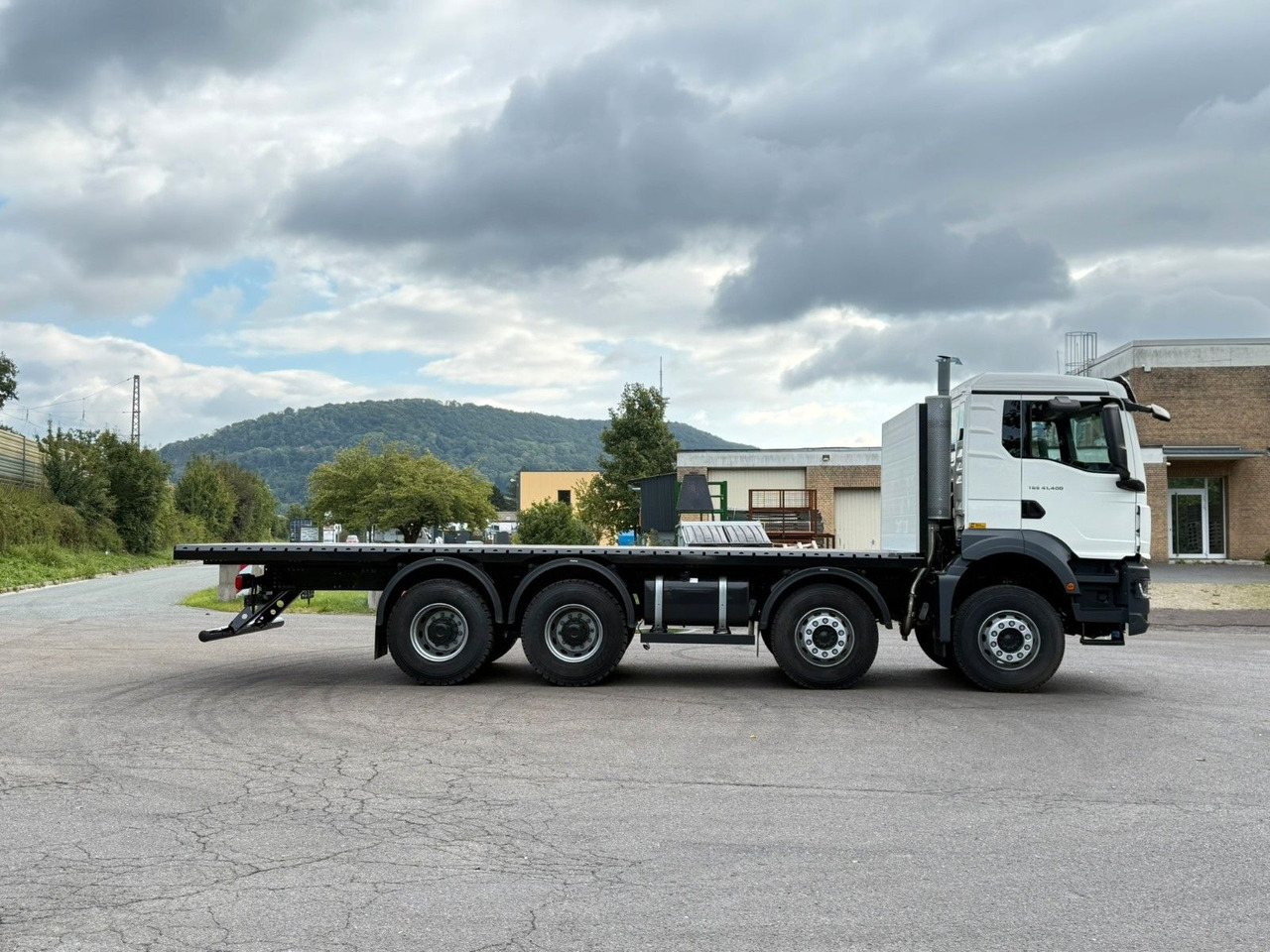 Kamion s otvorenim sandukom MAN TGS 41.400 BB 8X4: slika Kamion s otvorenim sandukom MAN TGS 41.400 BB 8X4