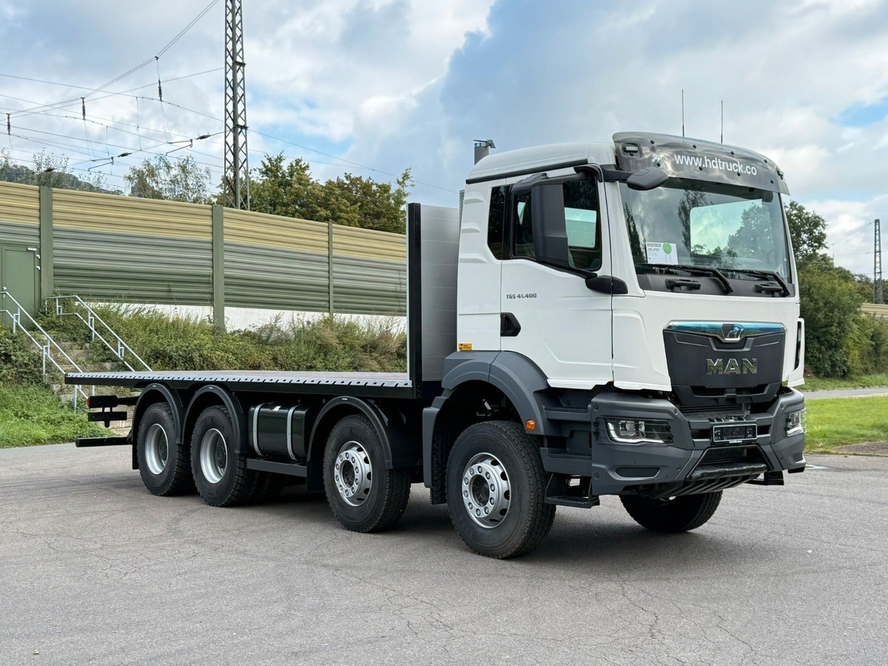 Kamion s otvorenim sandukom MAN TGS 41.400 BB 8X4: slika Kamion s otvorenim sandukom MAN TGS 41.400 BB 8X4