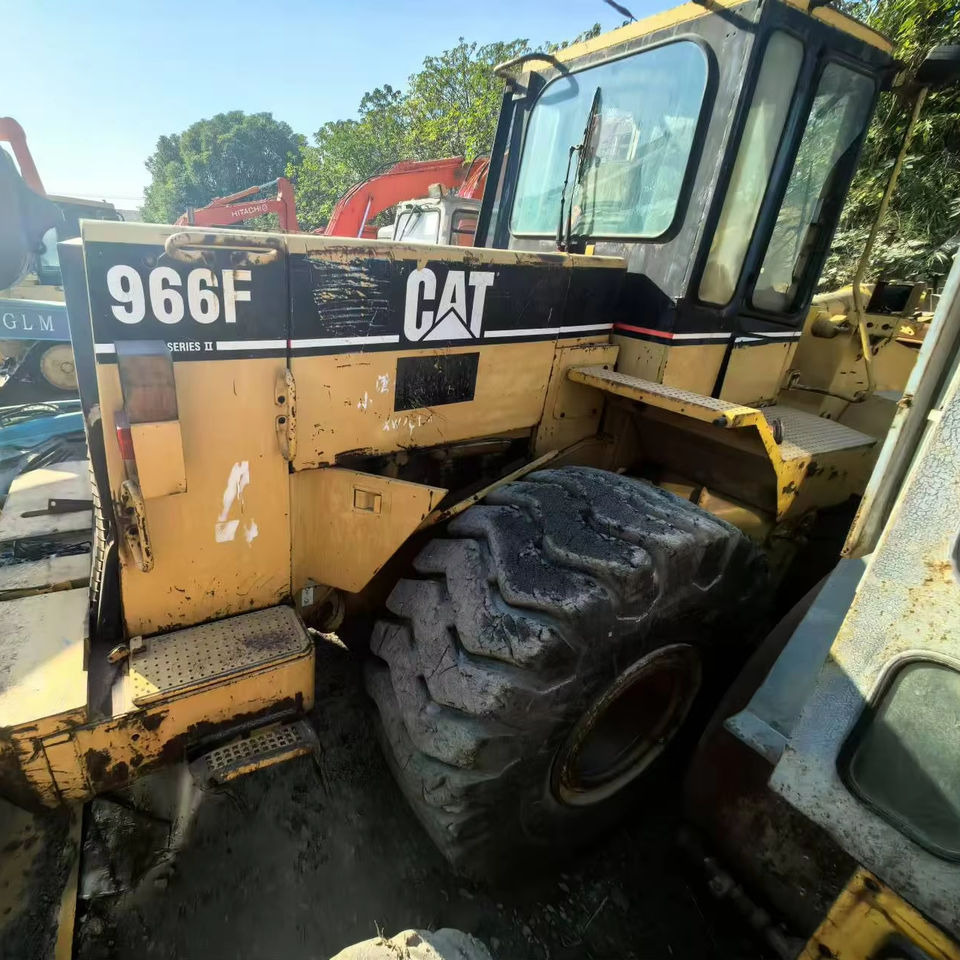 Used Front Wheel Loader CAT 966F With Good Price From Wheel Loaders Caterpillar Machinery Cat 966F Loaders - Utovarivač na kotačima: slika Used Front Wheel Loader CAT 966F With Good Price From Wheel Loaders Caterpillar Machinery Cat 966F Loaders - Utovarivač na kotačima Used Front Wheel Loader CAT 966F With Good Price From Wheel Loaders Caterpillar Machinery Cat 966F Loaders - Utovarivač na kotačima: slika Used Front Wheel Loader CAT 966F With Good Price From Wheel Loaders Caterpillar Machinery Cat 966F Loaders - Utovarivač na kotačima