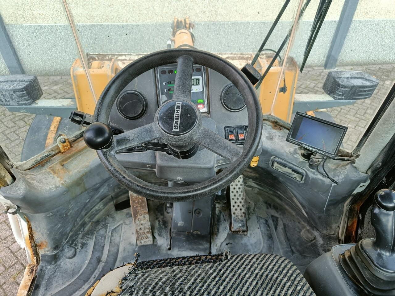 Liebherr L514 Shovel - Utovarivač na kotačima: slika Liebherr L514 Shovel - Utovarivač na kotačima Liebherr L514 Shovel - Utovarivač na kotačima: slika Liebherr L514 Shovel - Utovarivač na kotačima