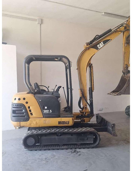 Caterpillar 302.5 - Mini bager: slika Caterpillar 302.5 - Mini bager Caterpillar 302.5 - Mini bager: slika Caterpillar 302.5 - Mini bager