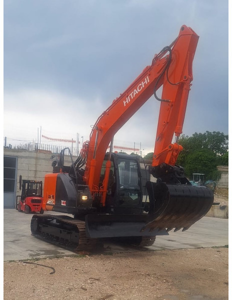 Hitachi ZX135US-6 - Bager: slika Hitachi ZX135US-6 - Bager Hitachi ZX135US-6 - Bager: slika Hitachi ZX135US-6 - Bager