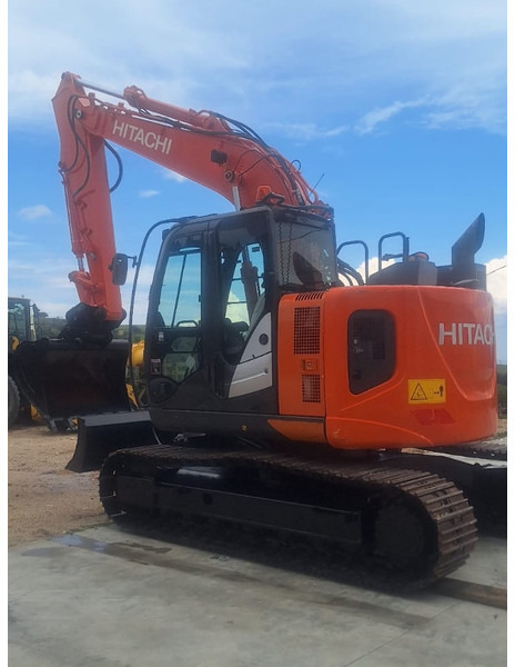 Hitachi ZX135US-6 - Bager: slika Hitachi ZX135US-6 - Bager Hitachi ZX135US-6 - Bager: slika Hitachi ZX135US-6 - Bager