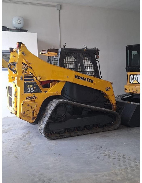 Komatsu CK35 - Kompaktni utovarivač gusjeničar: slika Komatsu CK35 - Kompaktni utovarivač gusjeničar Komatsu CK35 - Kompaktni utovarivač gusjeničar: slika Komatsu CK35 - Kompaktni utovarivač gusjeničar