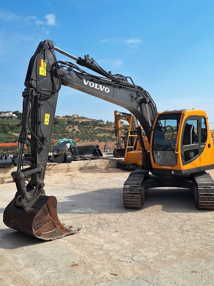 VOLVO EC140BLC - Bager gusjeničar: slika VOLVO EC140BLC - Bager gusjeničar VOLVO EC140BLC - Bager gusjeničar: slika VOLVO EC140BLC - Bager gusjeničar