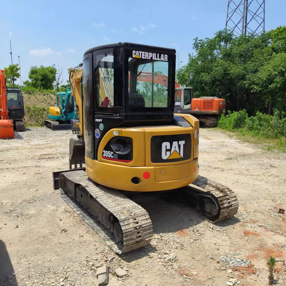 CATERPILLAR 305 - Mini bager: slika CATERPILLAR 305 - Mini bager CATERPILLAR 305 - Mini bager: slika CATERPILLAR 305 - Mini bager