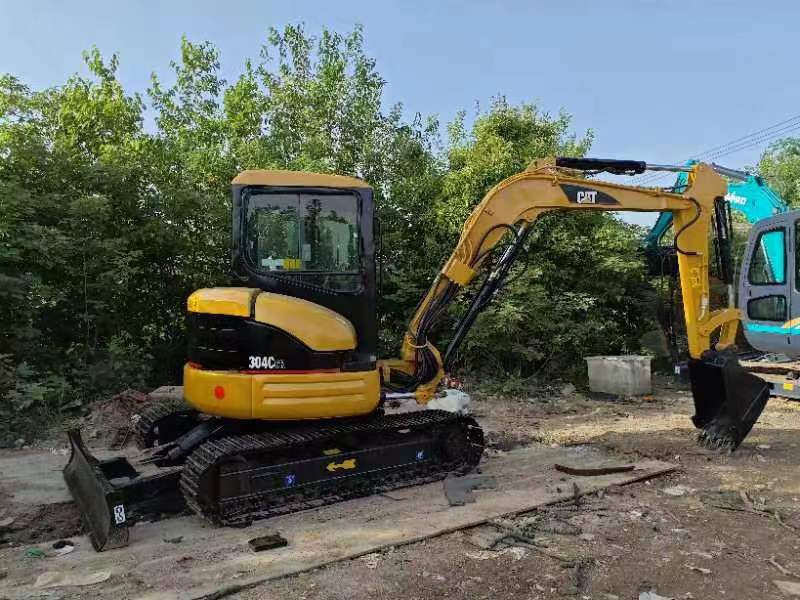 Mini bager CATERPILLAR 305: slika Mini bager CATERPILLAR 305