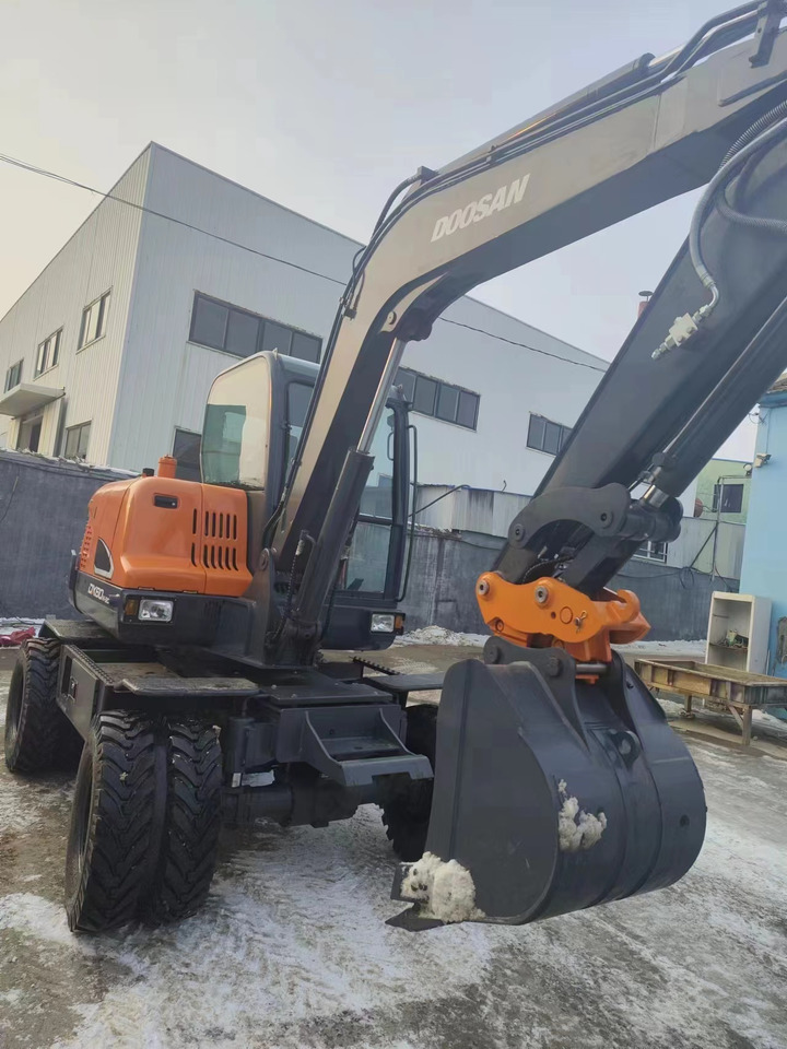 DOOSAN DX60w-9c - Mini bager: slika DOOSAN DX60w-9c - Mini bager DOOSAN DX60w-9c - Mini bager: slika DOOSAN DX60w-9c - Mini bager