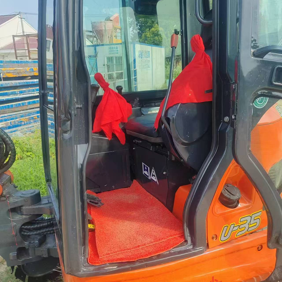 Mini bager KUBOTA U35: slika Mini bager KUBOTA U35 Mini bager KUBOTA U35: slika Mini bager KUBOTA U35