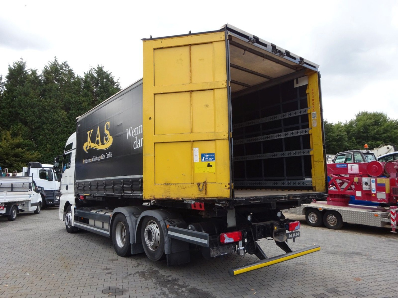 MAN 26.440 TGX BDF Wechselsystem 6x2 - Transporter kontejnera/ Kamion s izmjenjivim sanducima: slika MAN 26.440 TGX BDF Wechselsystem 6x2 - Transporter kontejnera/ Kamion s izmjenjivim sanducima MAN 26.440 TGX BDF Wechselsystem 6x2 - Transporter kontejnera/ Kamion s izmjenjivim sanducima: slika MAN 26.440 TGX BDF Wechselsystem 6x2 - Transporter kontejnera/ Kamion s izmjenjivim sanducima