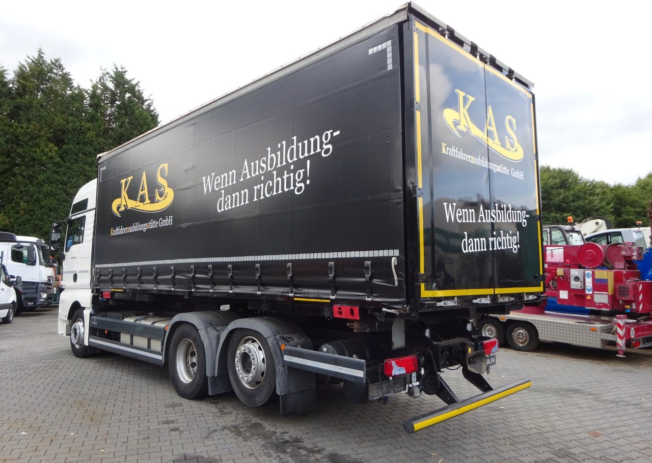 MAN 26.440 TGX BDF Wechselsystem 6x2 - Transporter kontejnera/ Kamion s izmjenjivim sanducima: slika MAN 26.440 TGX BDF Wechselsystem 6x2 - Transporter kontejnera/ Kamion s izmjenjivim sanducima MAN 26.440 TGX BDF Wechselsystem 6x2 - Transporter kontejnera/ Kamion s izmjenjivim sanducima: slika MAN 26.440 TGX BDF Wechselsystem 6x2 - Transporter kontejnera/ Kamion s izmjenjivim sanducima