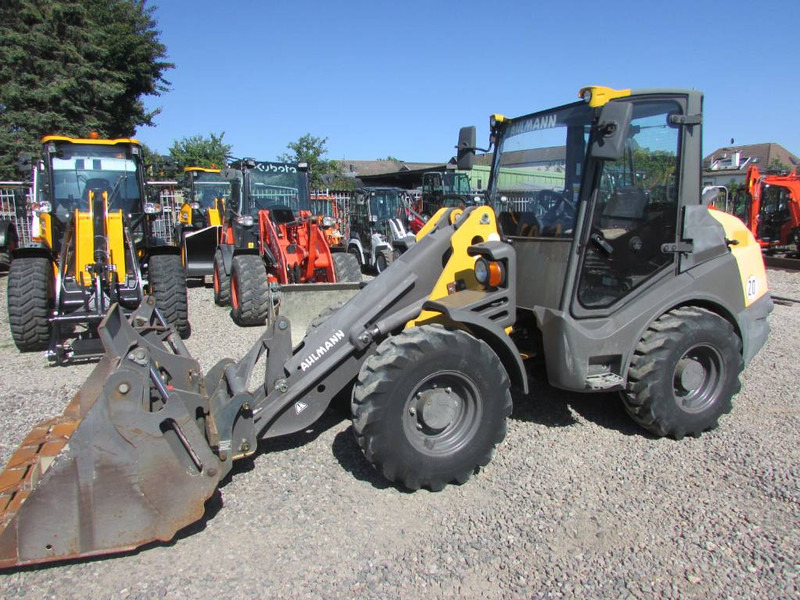 Ahlmann AX 850 Radlader Mecalac - Utovarivač na kotačima: slika Ahlmann AX 850 Radlader Mecalac - Utovarivač na kotačima Ahlmann AX 850 Radlader Mecalac - Utovarivač na kotačima: slika Ahlmann AX 850 Radlader Mecalac - Utovarivač na kotačima