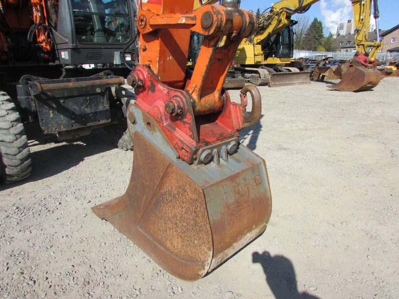 Hitachi ZX 140 W-3 Mobilbagger 48.000 EUR / Klima - Bager na kotačima: slika Hitachi ZX 140 W-3 Mobilbagger 48.000 EUR / Klima - Bager na kotačima Hitachi ZX 140 W-3 Mobilbagger 48.000 EUR / Klima - Bager na kotačima: slika Hitachi ZX 140 W-3 Mobilbagger 48.000 EUR / Klima - Bager na kotačima