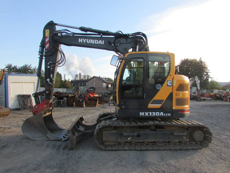 Hyundai HX 130 ALCR Kettenbagger 77.500 EUR / AC - Bager gusjeničar: slika Hyundai HX 130 ALCR Kettenbagger 77.500 EUR / AC - Bager gusjeničar Hyundai HX 130 ALCR Kettenbagger 77.500 EUR / AC - Bager gusjeničar: slika Hyundai HX 130 ALCR Kettenbagger 77.500 EUR / AC - Bager gusjeničar