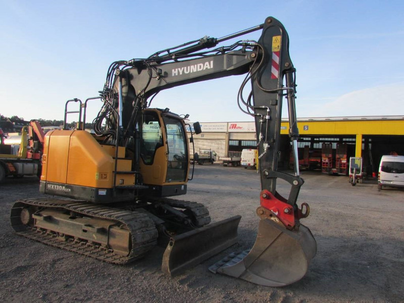 Hyundai HX 130 ALCR Kettenbagger 77.500 EUR / AC - Bager gusjeničar: slika Hyundai HX 130 ALCR Kettenbagger 77.500 EUR / AC - Bager gusjeničar Hyundai HX 130 ALCR Kettenbagger 77.500 EUR / AC - Bager gusjeničar: slika Hyundai HX 130 ALCR Kettenbagger 77.500 EUR / AC - Bager gusjeničar